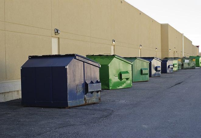 portable, green construction dumpsters serving as a container for scrap materials in Troy MO